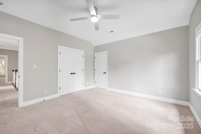 12711 Duncourtney Ln, Charlotte, NC 28277 - unfurnished bedroom with light carpet, baseboards, and a ceiling fan