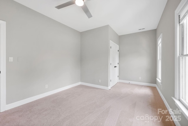 12711 Duncourtney Ln, Charlotte, NC 28277 - empty room featuring light colored carpet, a ceiling fan, and baseboards