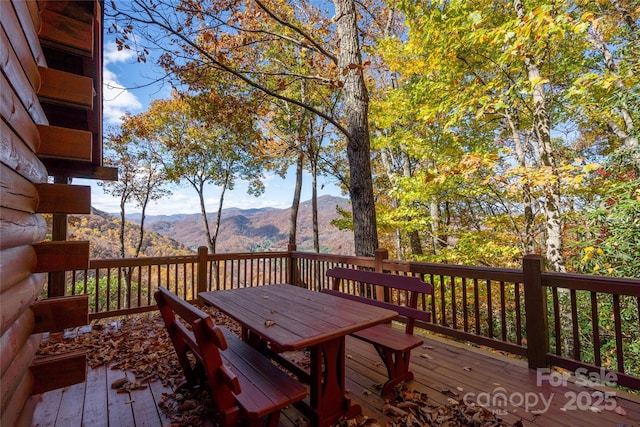 339 Tsalagi Trl, Maggie Valley, NC 28751 - wooden terrace with a mountain view and outdoor dining area