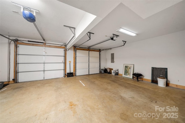 339 Tsalagi Trl, Maggie Valley, NC 28751 - garage with a garage door opener and electric panel