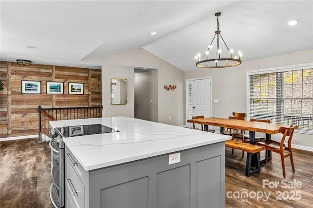 137 Weaver Ct, Lake Lure, NC 28746 - kitchen featuring gray cabinetry, electric stove, dark wood finished floors, a chandelier, and vaulted ceiling
