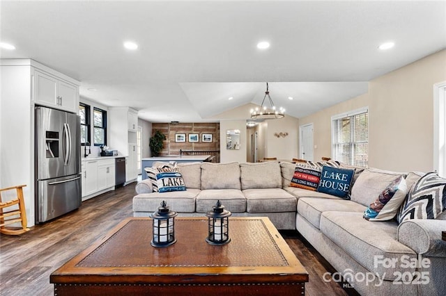 137 Weaver Ct, Lake Lure, NC 28746 - living area featuring dark wood finished floors, a chandelier, recessed lighting, and vaulted ceiling