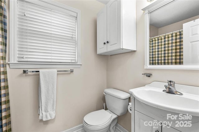 137 Weaver Ct, Lake Lure, NC 28746 - full bath with baseboards, vanity, and toilet
