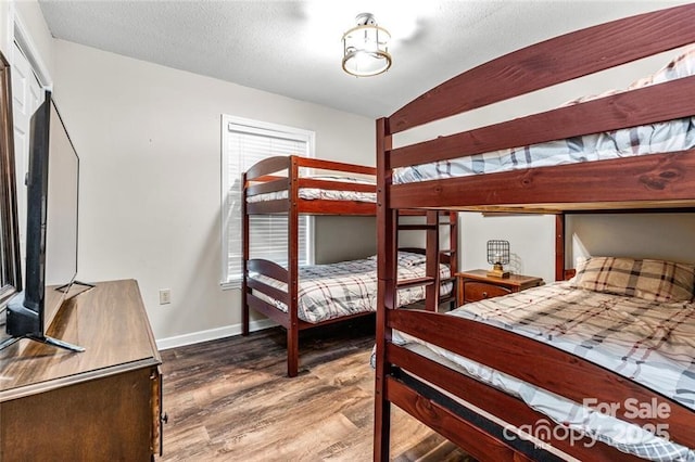 137 Weaver Ct, Lake Lure, NC 28746 - bedroom featuring wood finished floors and baseboards