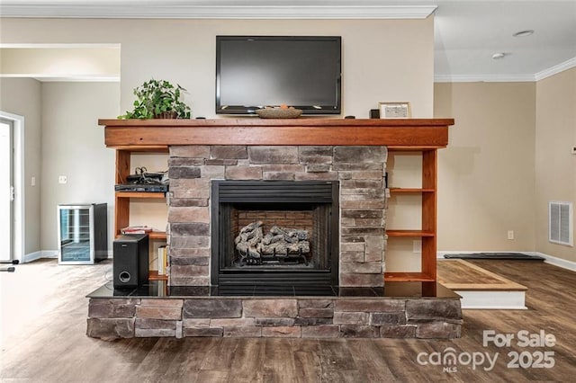 137 Weaver Ct, Lake Lure, NC 28746 - detailed view of beverage cooler, wood finished floors, a fireplace, baseboards, and crown molding