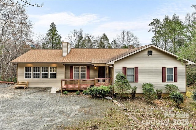 137 Weaver Ct, Lake Lure, NC 28746 - view of front of home featuring a chimney and a deck