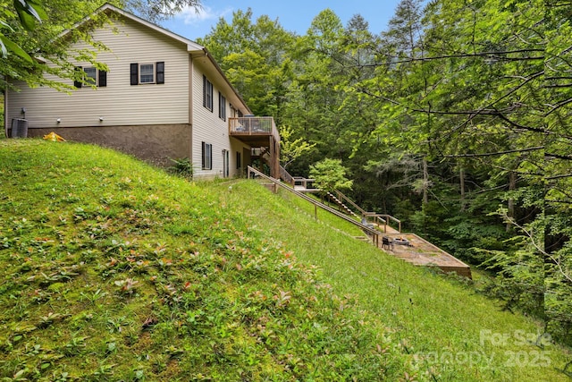137 Weaver Ct, Lake Lure, NC 28746 - view of yard with a deck and a forest view