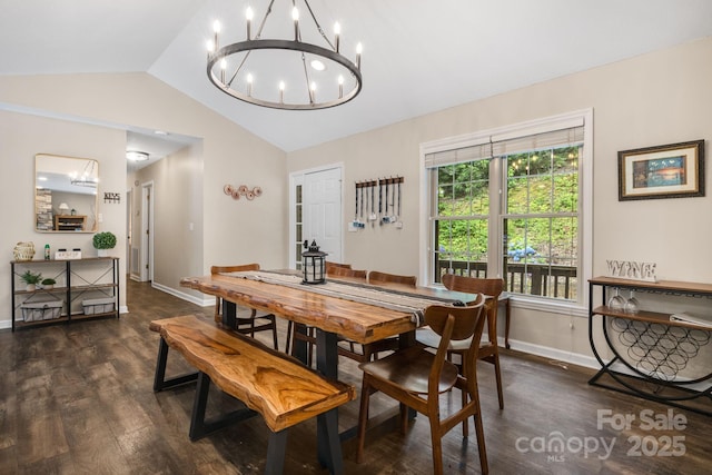 137 Weaver Ct, Lake Lure, NC 28746 - dining space featuring a chandelier, lofted ceiling, and dark wood-type flooring