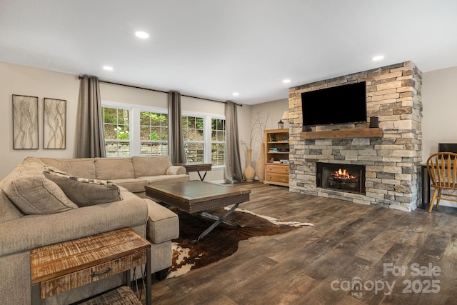 137 Weaver Ct, Lake Lure, NC 28746 - living area with wood finished floors, a stone fireplace, and recessed lighting