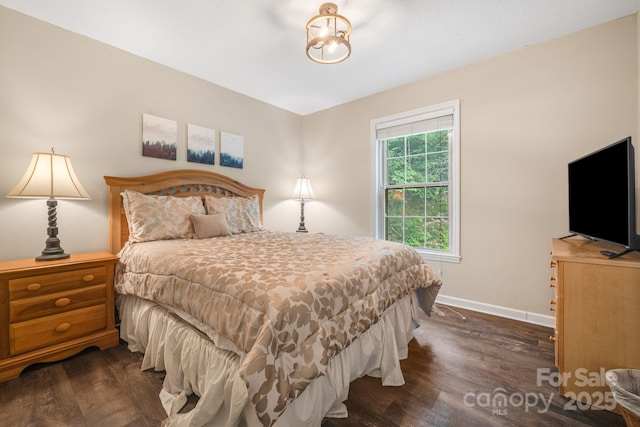 137 Weaver Ct, Lake Lure, NC 28746 - bedroom with dark wood-style floors and baseboards
