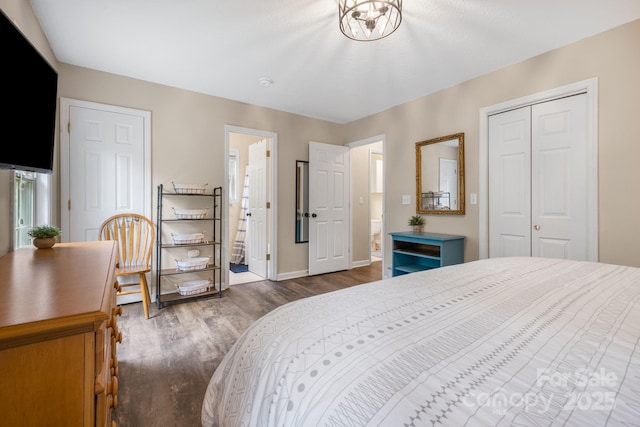 137 Weaver Ct, Lake Lure, NC 28746 - bedroom with dark wood-style floors and a closet