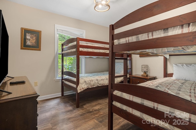 137 Weaver Ct, Lake Lure, NC 28746 - bedroom featuring wood finished floors and lofted ceiling