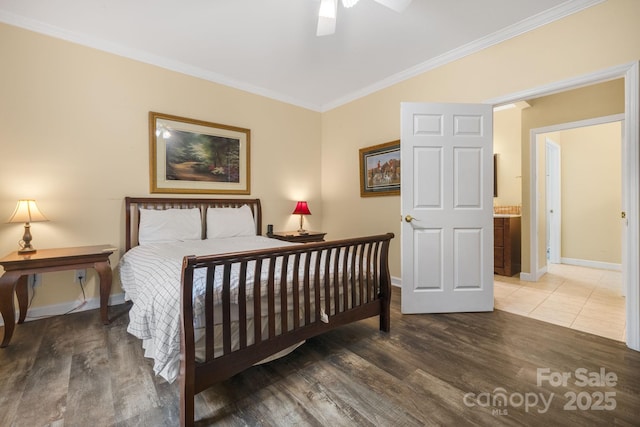137 Weaver Ct, Lake Lure, NC 28746 - bedroom with ornamental molding, wood finished floors, and a ceiling fan