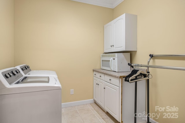 137 Weaver Ct, Lake Lure, NC 28746 - washroom featuring cabinet space, independent washer and dryer, crown molding, and light tile patterned flooring