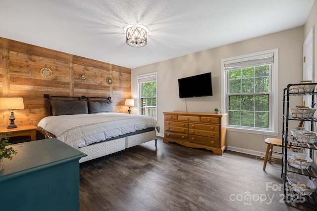 137 Weaver Ct, Lake Lure, NC 28746 - bedroom with wood walls and wood finished floors