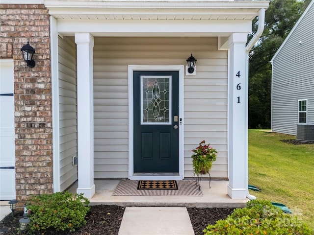 461 Misty Law Ln, Clover, SC 29710 - doorway to property with a lawn, cooling unit, and a porch