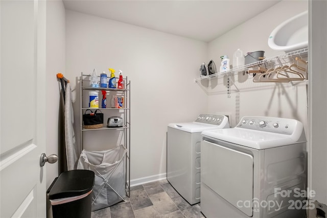 461 Misty Law Ln, Clover, SC 29710 - washroom featuring separate washer and dryer and light stone finish floors