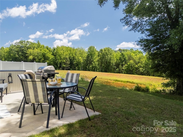 461 Misty Law Ln, Clover, SC 29710 - view of patio / terrace featuring outdoor dining space, a grill, and a wooded view