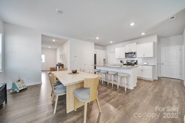 461 Misty Law Ln, Clover, SC 29710 - dining room with wood finished floors and recessed lighting