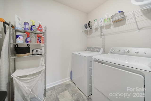 461 Misty Law Ln, Clover, SC 29710 - washroom with washing machine and dryer and light stone finish flooring