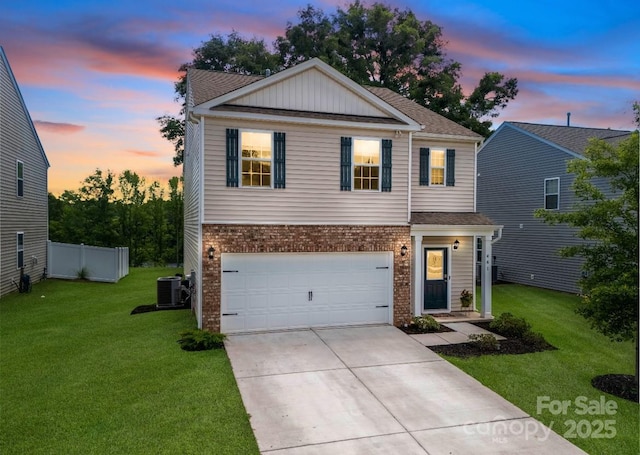 461 Misty Law Ln, Clover, SC 29710 - traditional-style house with brick siding, concrete driveway, an attached garage, and a shingled roof