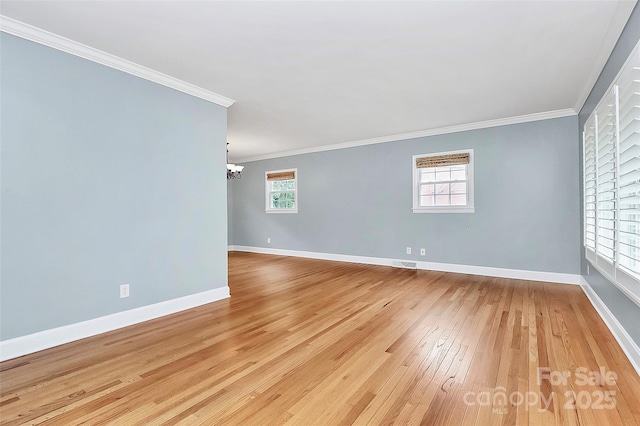 6908 Lancer Dr, Charlotte, NC 28226 - unfurnished room with a chandelier, crown molding, light wood finished floors, and baseboards