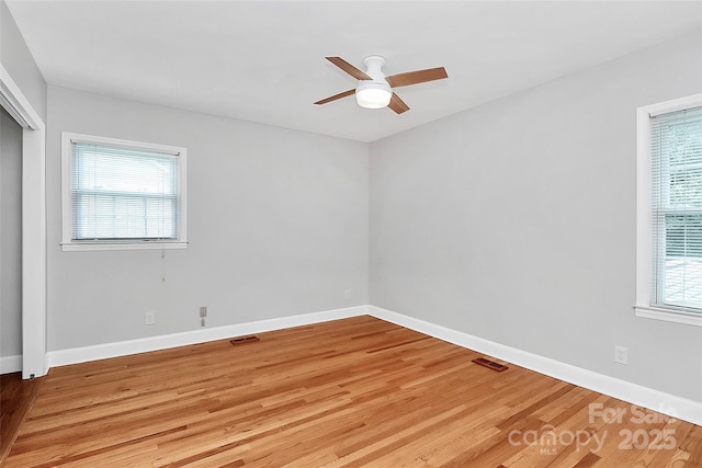 6908 Lancer Dr, Charlotte, NC 28226 - spare room featuring ceiling fan, light wood-style flooring, and baseboards