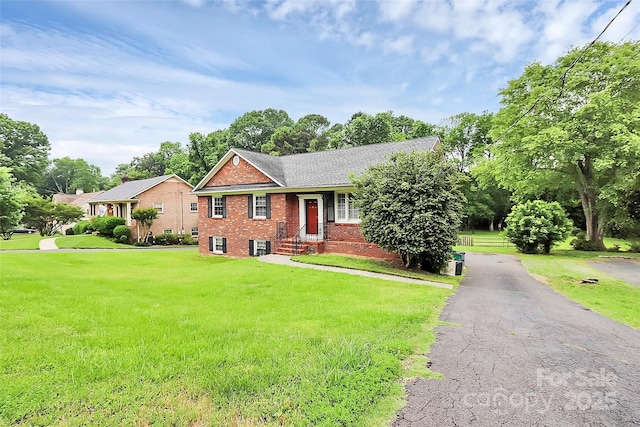 6908 Lancer Dr, Charlotte, NC 28226 - view of front facade featuring brick siding and a front lawn