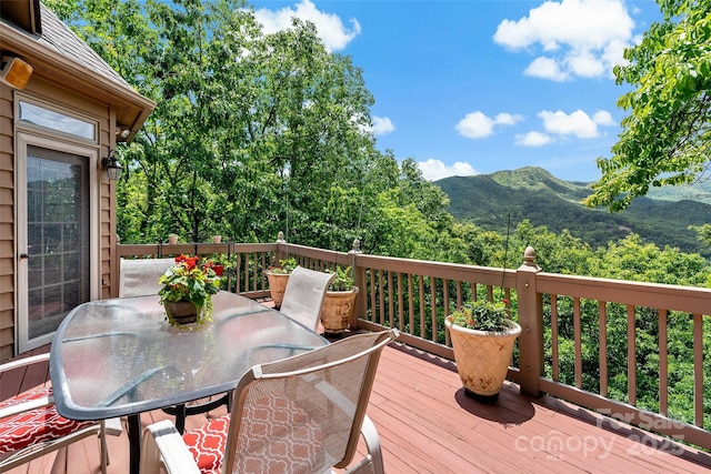 65 Timber Park Dr, Black Mountain, NC 28711 - wooden deck with outdoor dining area and a mountain view