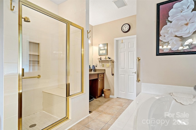 65 Timber Park Dr, Black Mountain, NC 28711 - bathroom with vanity, a shower stall, a bath, and tile patterned flooring