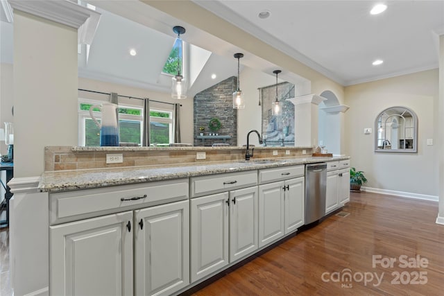 10620 Euclid Ave NW, Concord, NC 28027 - kitchen featuring a sink, dishwasher, white cabinets, dark wood-style flooring, and vaulted ceiling