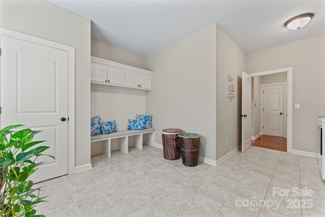10620 Euclid Ave NW, Concord, NC 28027 - mudroom featuring baseboards and light tile patterned floors
