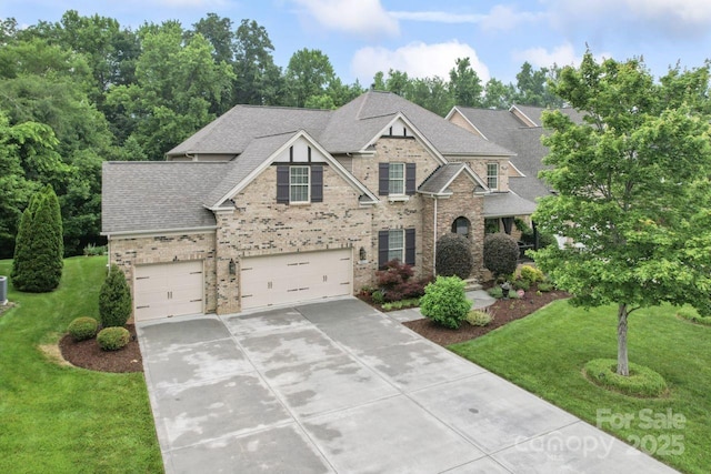 10620 Euclid Ave NW, Concord, NC 28027 - view of front of property featuring concrete driveway, roof with shingles, a front lawn, brick siding, and an attached garage
