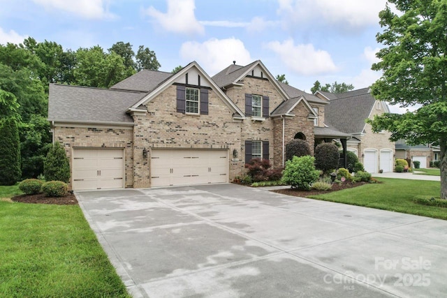 10620 Euclid Ave NW, Concord, NC 28027 - view of front of home featuring brick siding, concrete driveway, an attached garage, a front yard, and roof with shingles