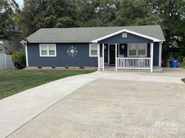132 Marina Ln, Mooresville, NC 28117 - ranch-style home featuring covered porch, roof with shingles, and concrete driveway