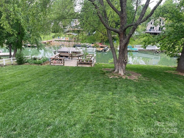 132 Marina Ln, Mooresville, NC 28117 - view of grassy yard with a water view and a boat dock