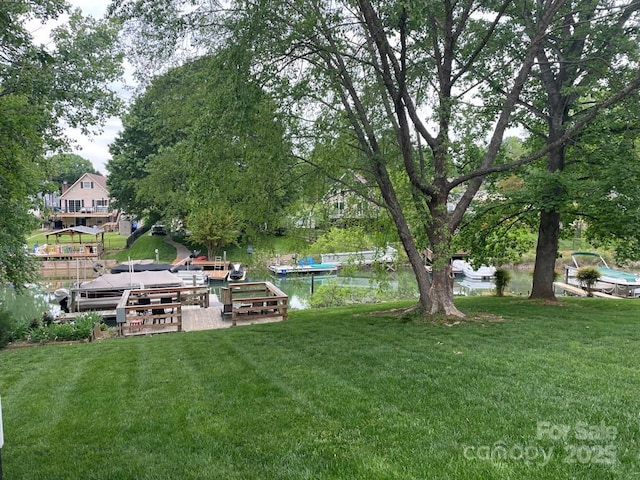 132 Marina Ln, Mooresville, NC 28117 - view of green lawn with a boat dock