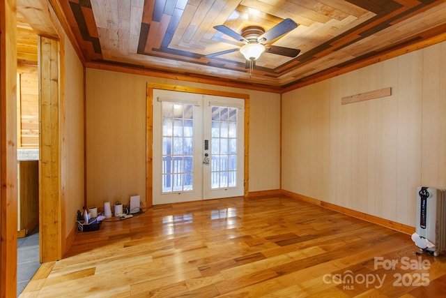 7150 Yellow Creek Rd, Robbinsville, NC 28771 - spare room with french doors, a ceiling fan, light wood finished floors, heating unit, and wooden walls