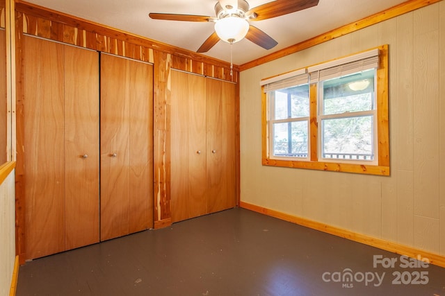 7150 Yellow Creek Rd, Robbinsville, NC 28771 - unfurnished bedroom featuring baseboards, ceiling fan, and a closet