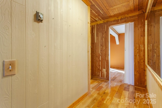 7150 Yellow Creek Rd, Robbinsville, NC 28771 - corridor featuring wooden walls, light wood-style flooring, and wood ceiling