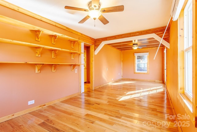7150 Yellow Creek Rd, Robbinsville, NC 28771 - unfurnished room with a ceiling fan, light wood-style flooring, baseboards, and beam ceiling