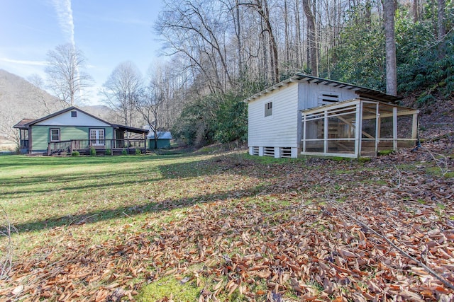 7150 Yellow Creek Rd, Robbinsville, NC 28771 - view of grassy yard with a deck