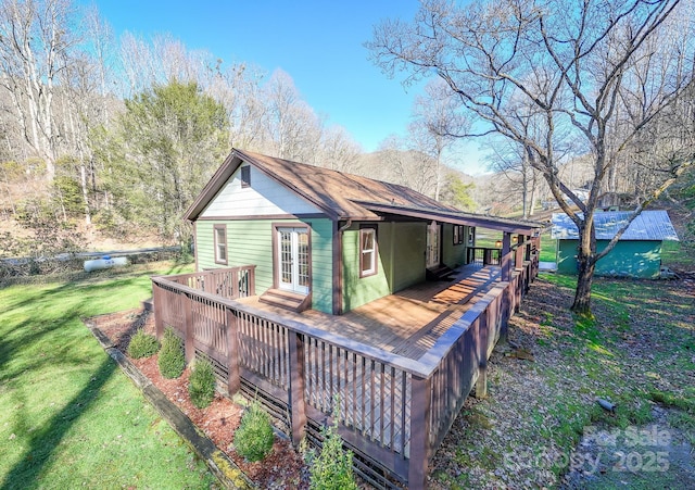 7150 Yellow Creek Rd, Robbinsville, NC 28771 - back of property featuring french doors, a lawn, and a wooden deck