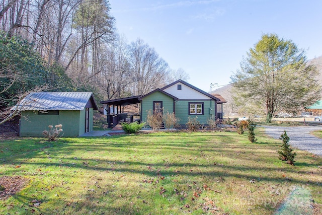 7150 Yellow Creek Rd, Robbinsville, NC 28771 - view of front facade with a front lawn