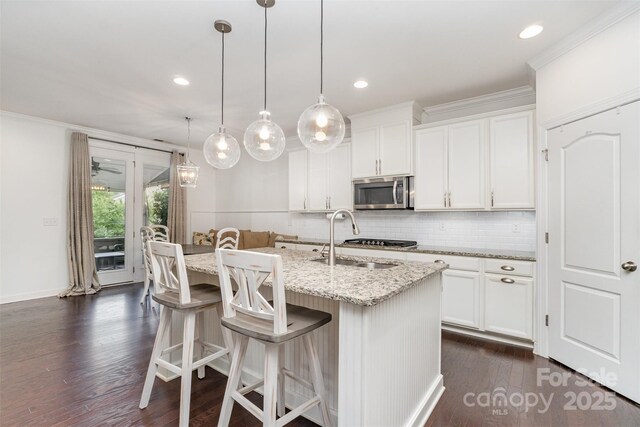 755 Lagan Ct, Fort Mill, SC 29715 - kitchen with appliances with stainless steel finishes, a sink, tasteful backsplash, recessed lighting, and dark wood-type flooring