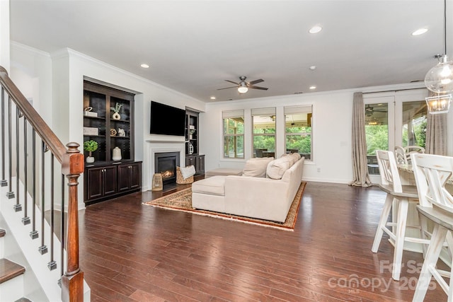 755 Lagan Ct, Fort Mill, SC 29715 - living area featuring crown molding, a ceiling fan, dark wood-type flooring, recessed lighting, and stairs