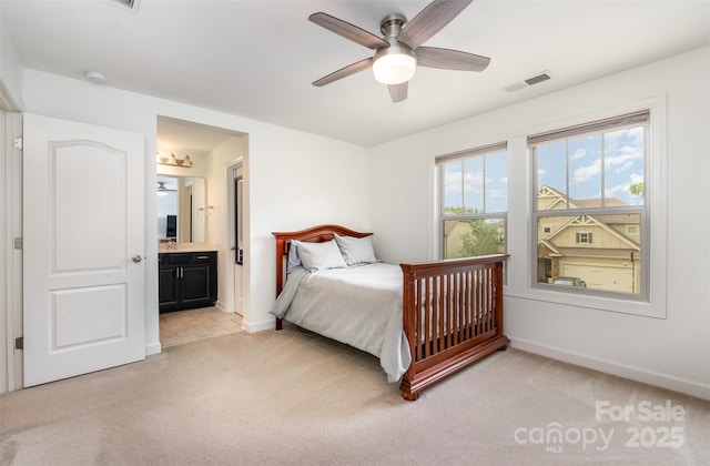755 Lagan Ct, Fort Mill, SC 29715 - bedroom featuring light carpet, baseboards, ensuite bath, and a ceiling fan