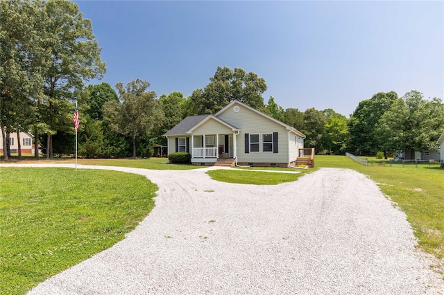 4285 Palmer Lloyd Rd, Lancaster, SC 29720 - view of front of house featuring curved driveway, crawl space, a porch, and a front lawn