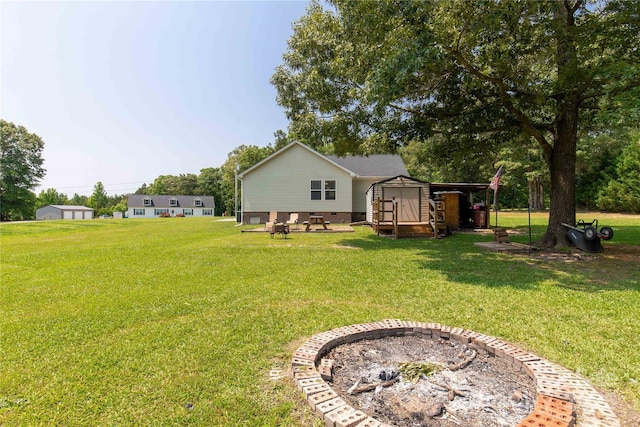 4285 Palmer Lloyd Rd, Lancaster, SC 29720 - view of grassy yard featuring a fire pit