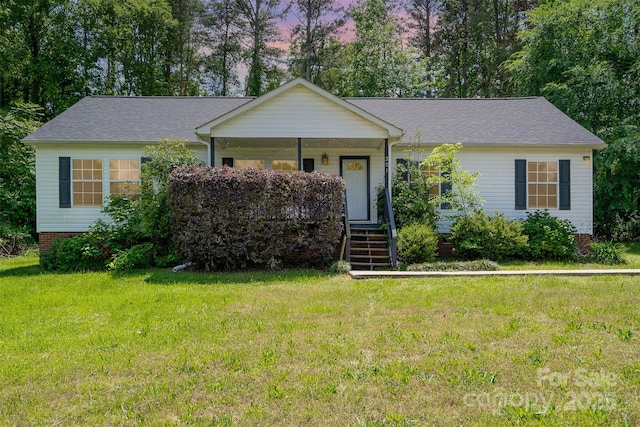 321 Woodcrest Dr, York, SC 29745 - single story home featuring a yard, a porch, stairway, and roof with shingles